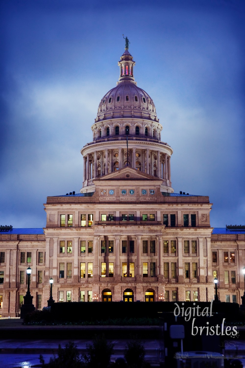 Texas State Capitol building in Austin on a rainy evening