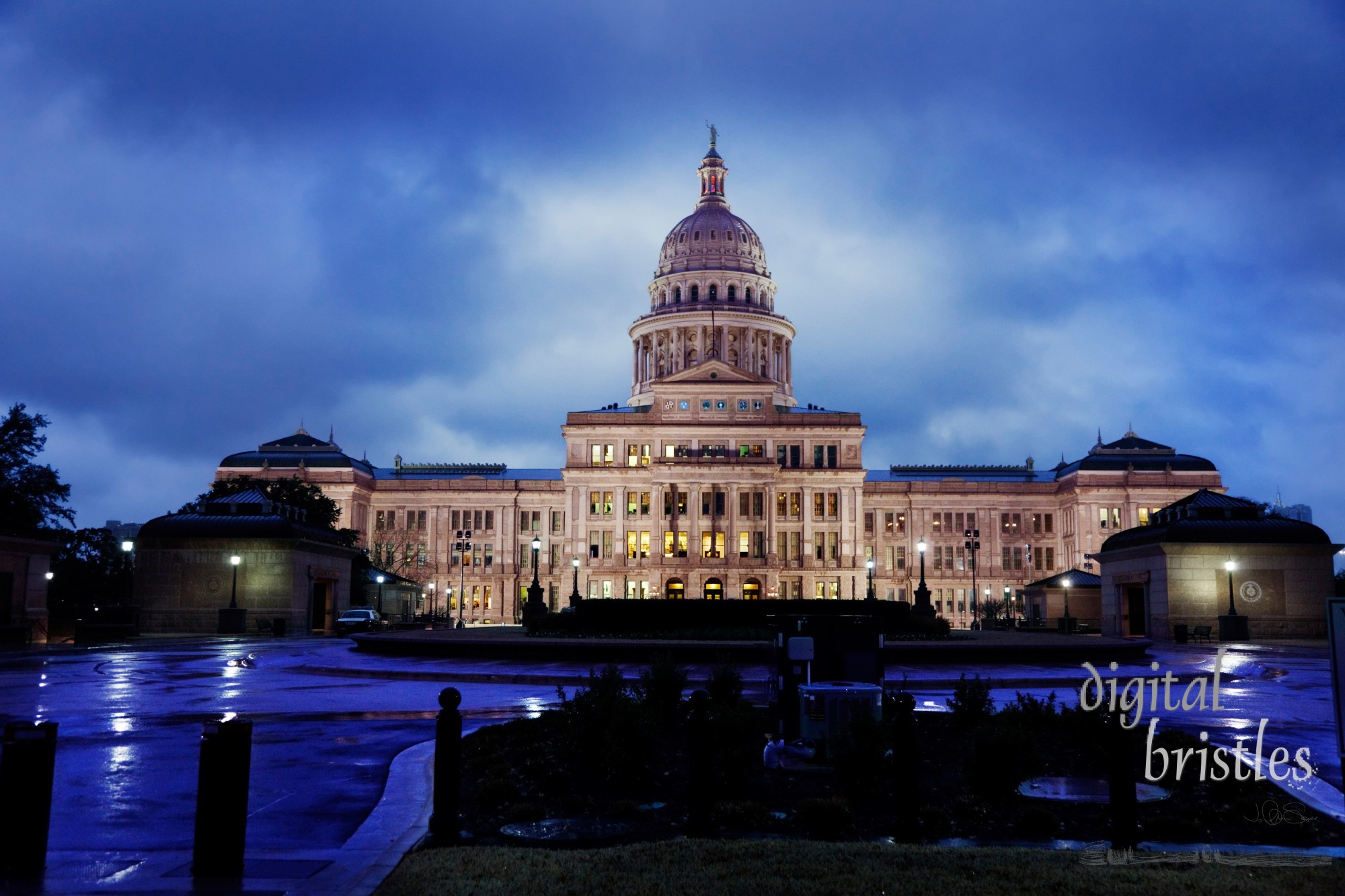 Texas State Capitol building in Austin on a rainy evening