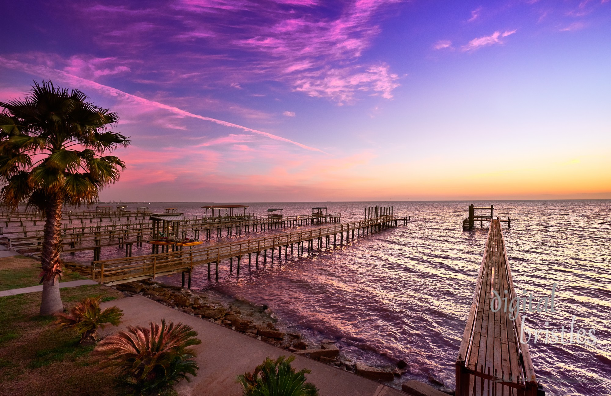 Firey colors in the sky at first light, Galveston Bay, Texas