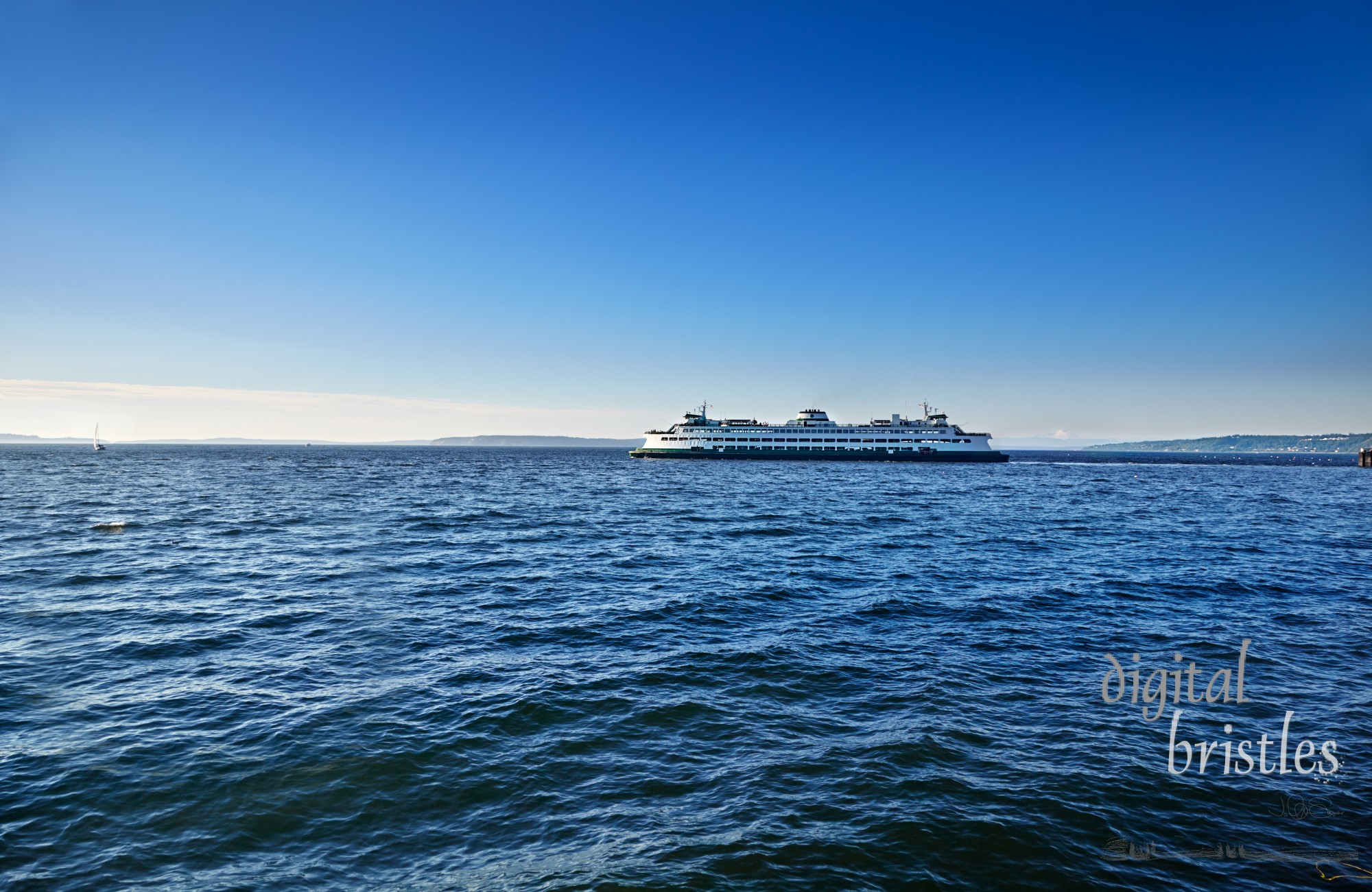 Washington State ferry leaving Edmonds dock for Kingston on a Summer afternoon