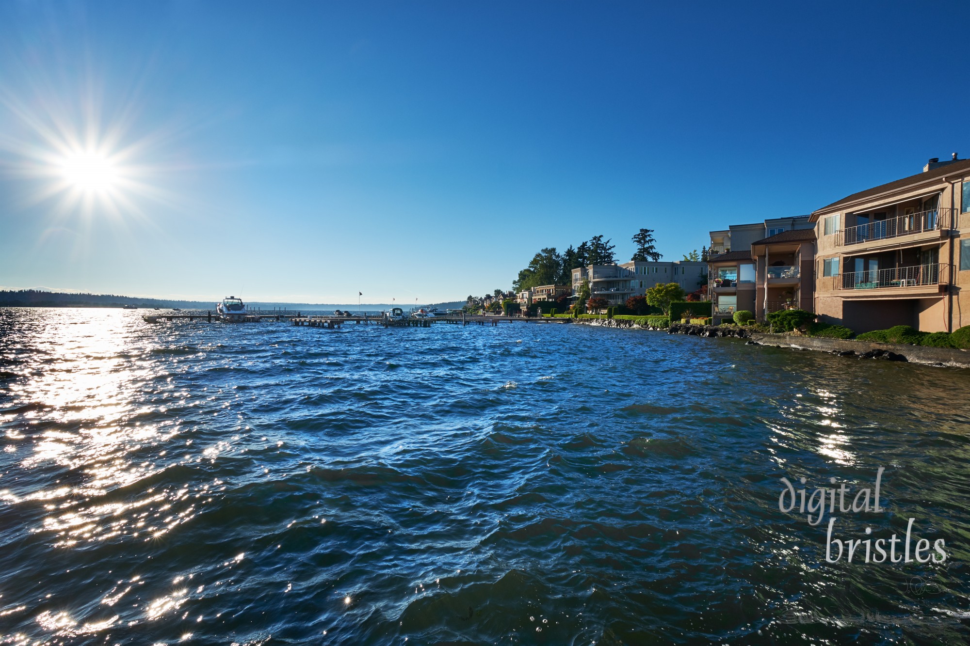 Lake Washington homes and docks in Kirkland, Washington on a sunny Summer evening