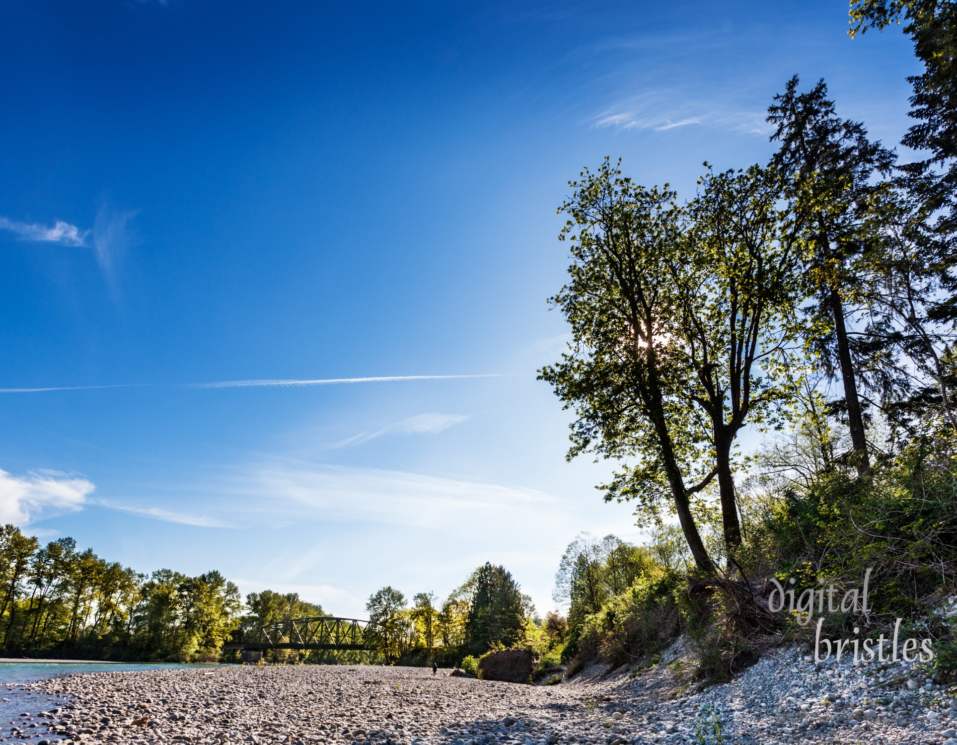 A sunny spring afternoon on the rocky edges of the Skykomish River in Monroe Washington