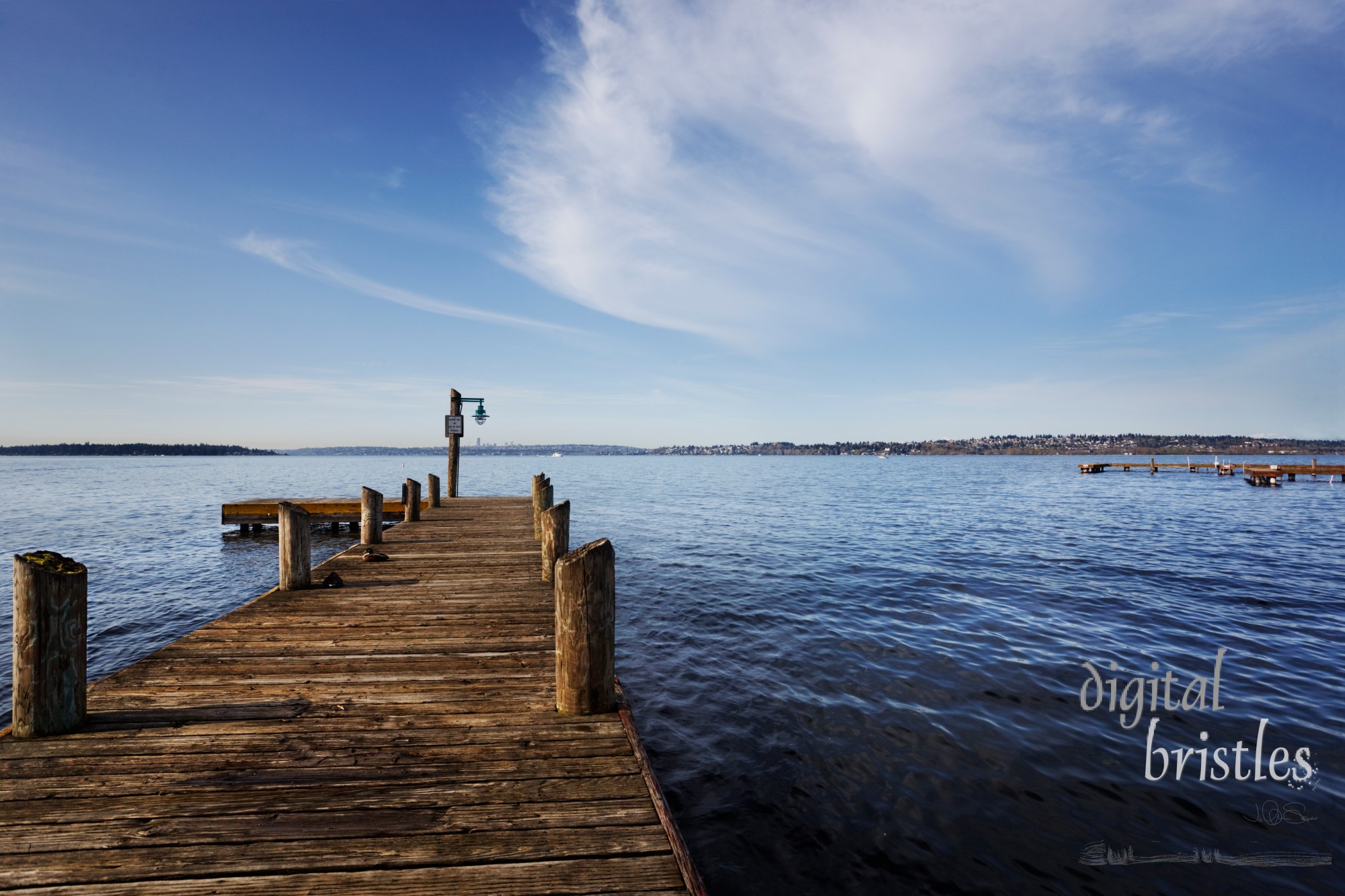 Public dock at Marine Point, Kirkland, Lake Washington, on a sunny Spring morning