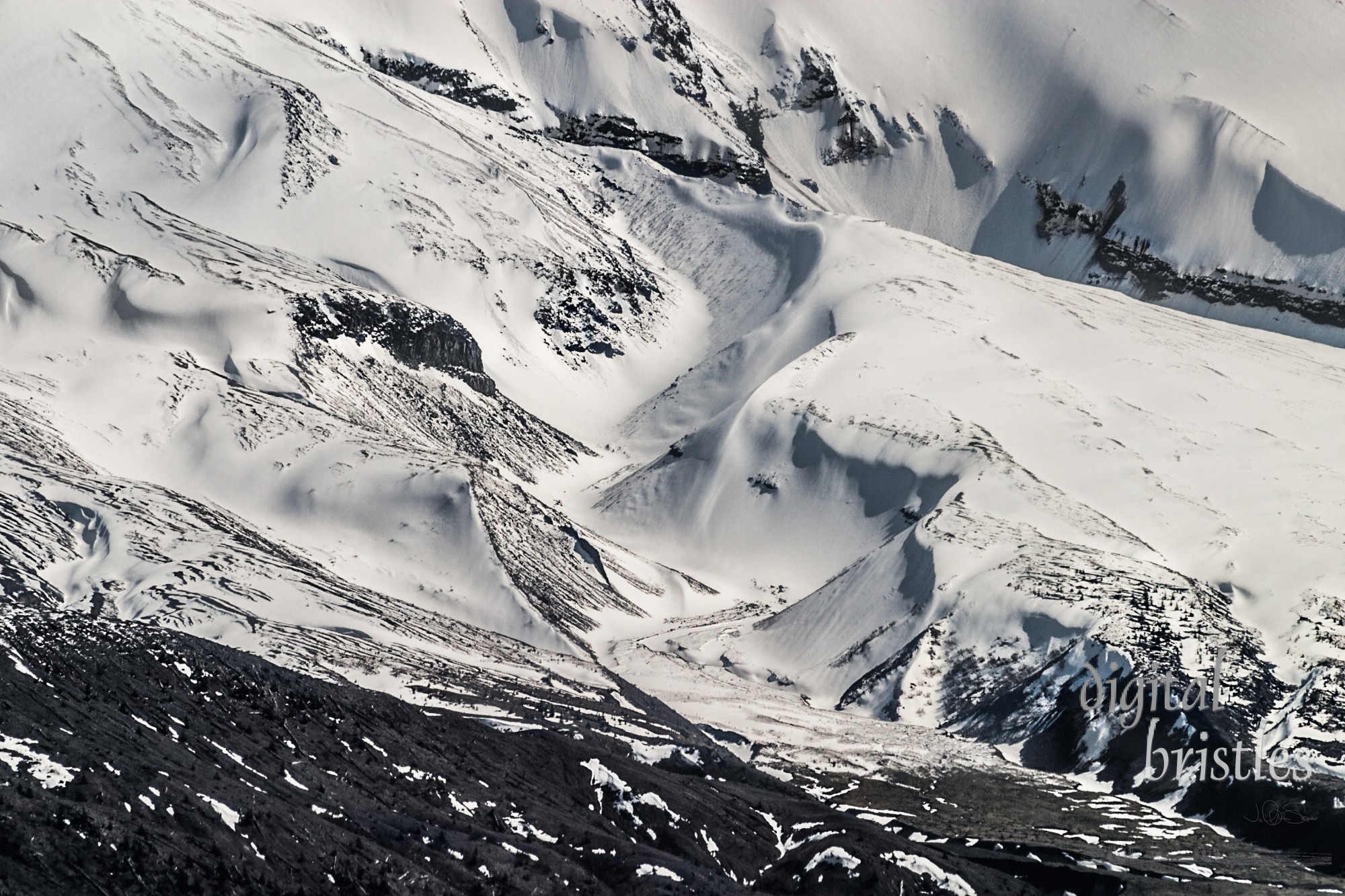 Swirls and ridges of snow on the slopes of Mt St Helens, Washington