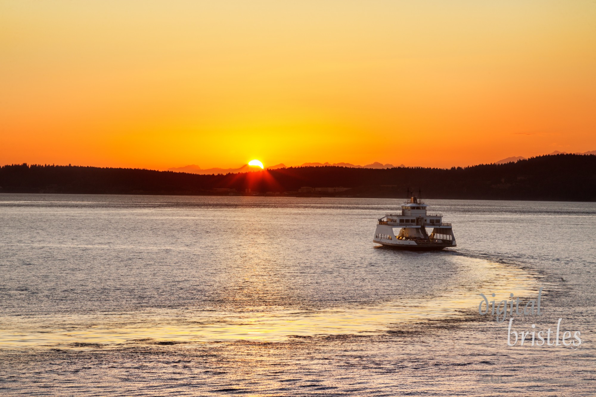 Car ferry heading out into the sunset from Steilacoom, Washington