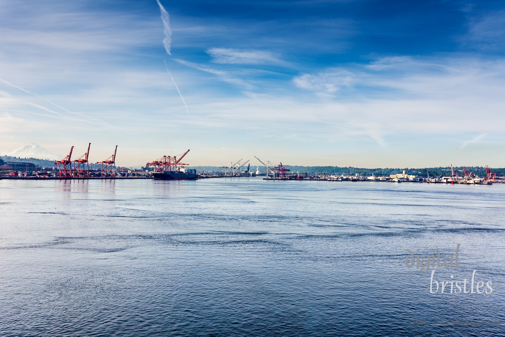 The Port of Seattle early on a sunny Sunday morning. Elliot Bay looking south down Puget Sound towards Mt. Rainier