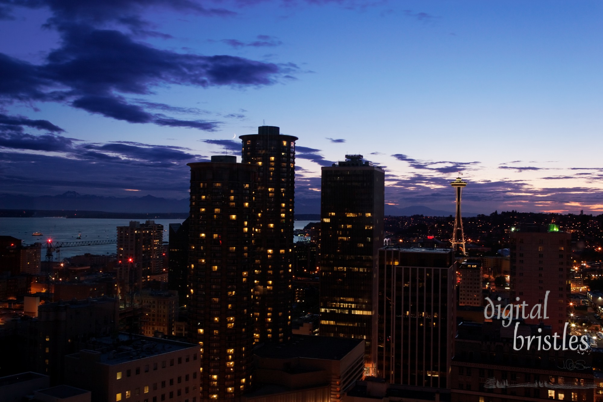 Sun setting over Seattle on July 4th (flag on the Space Needle)