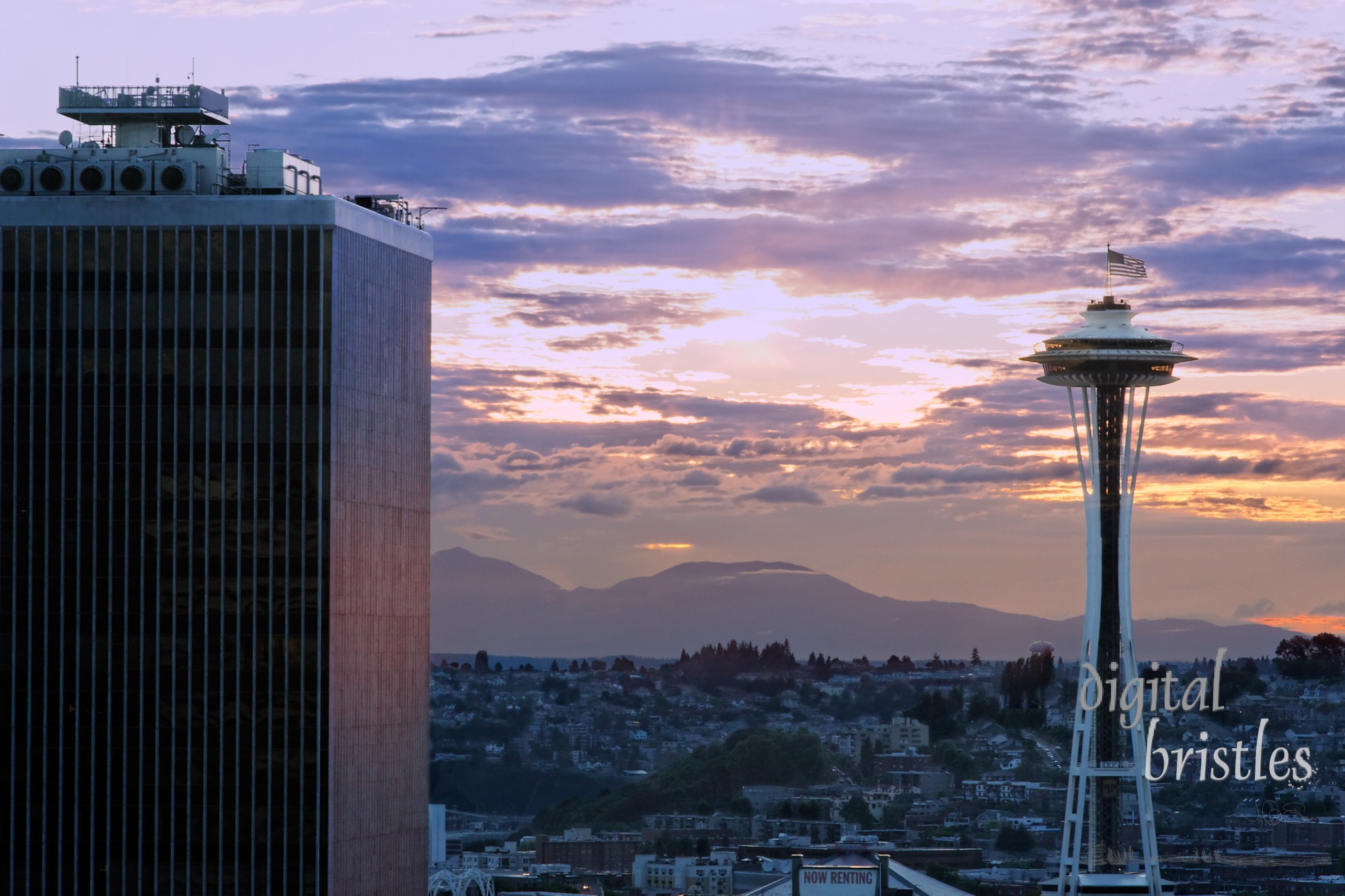 Sun sets on July 4th in Seattle (flag flying on the Space Needle) 