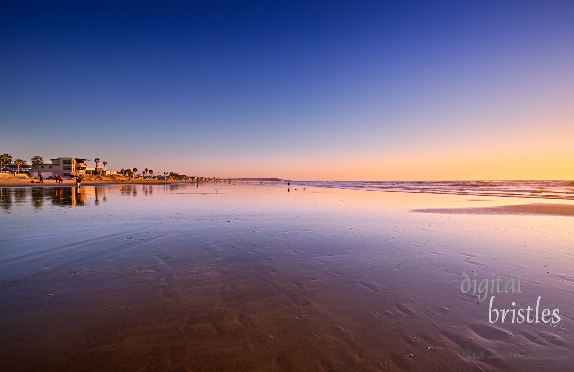 View South on Pacific Beach towards Mission Beach at low tide on a sunny Winter evening