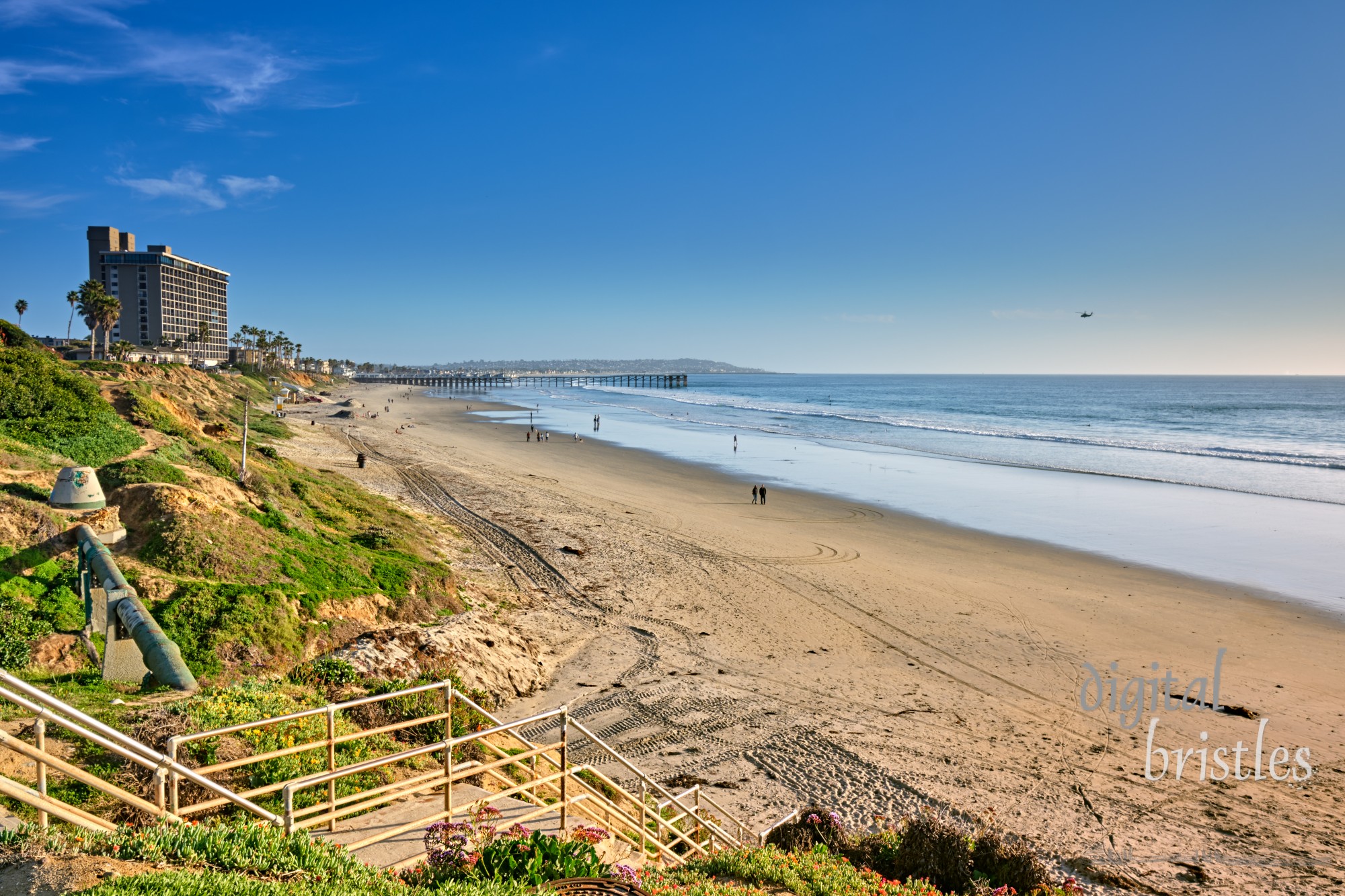 Stairs down from the top of the cliffs to North Pacific Beach, California, on a sunny Winter afternoon