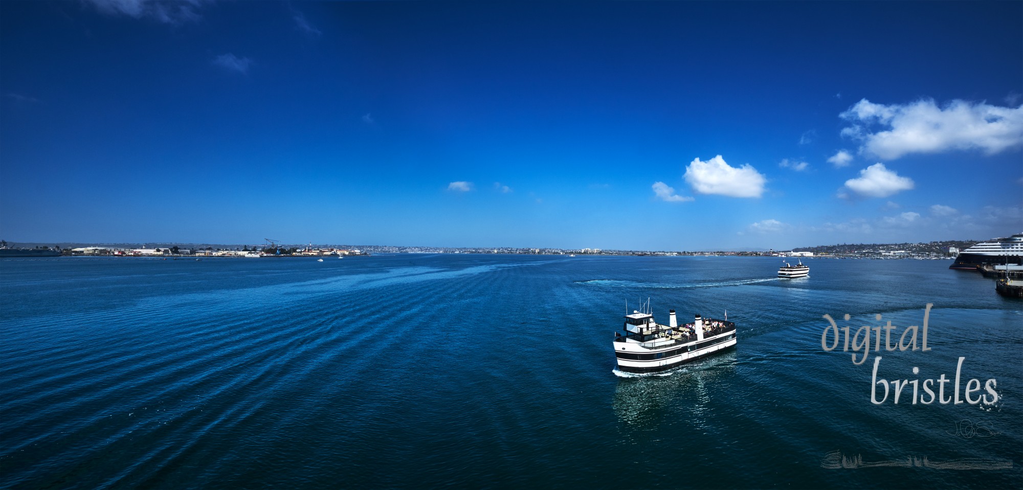 Panoramic view of the San Diego waterfront from the Embarcadero, past the airport to NAS North Island