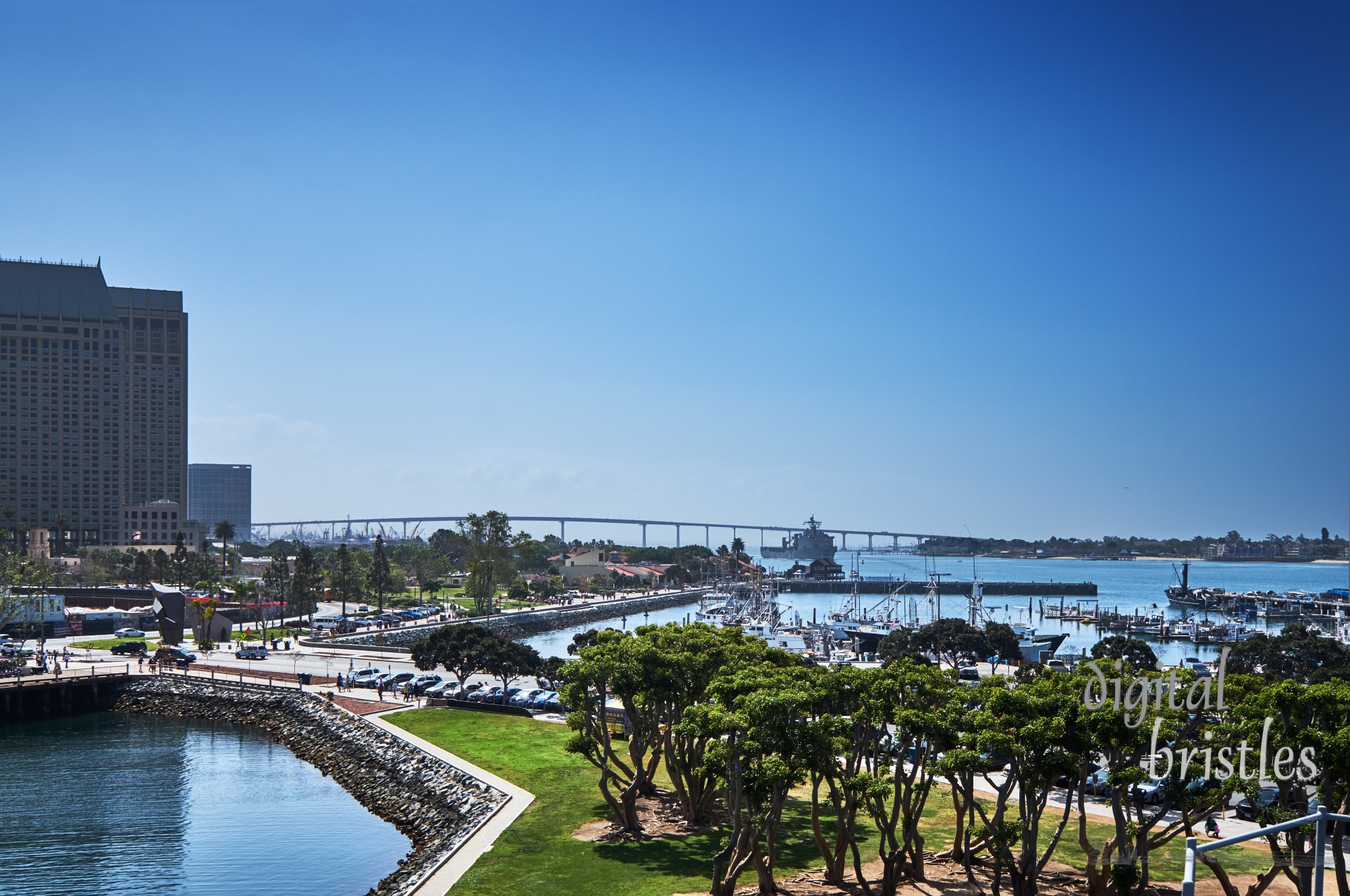 San Diego's waterfront at Tuna Harbor Park with Coronado and the Bay Bridge in the distance