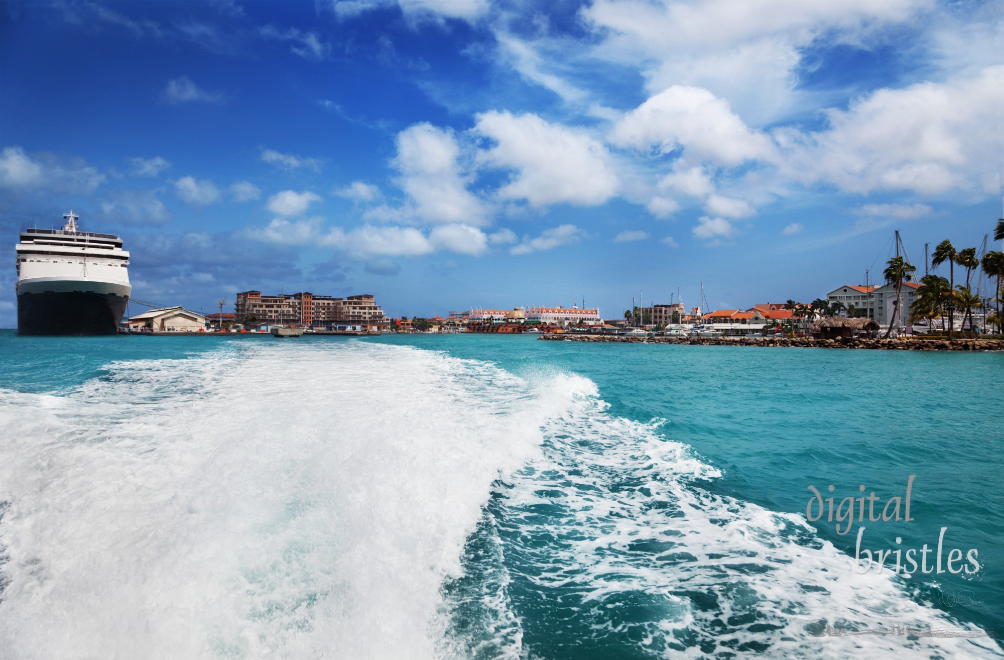 Leaving Oranjestad harbor, with the waterfront and cruise ship dock in the background