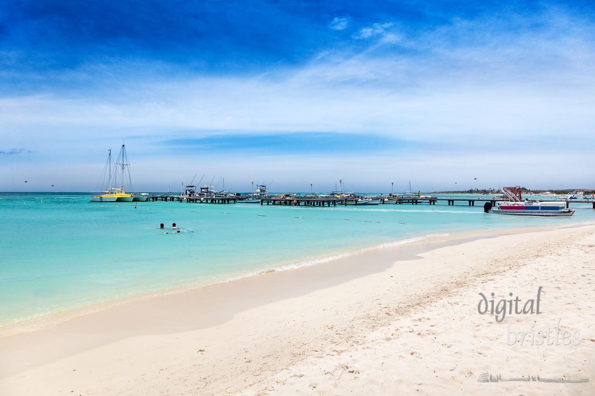 Fishing boats moored at the docks on Palm Beach, Aruba