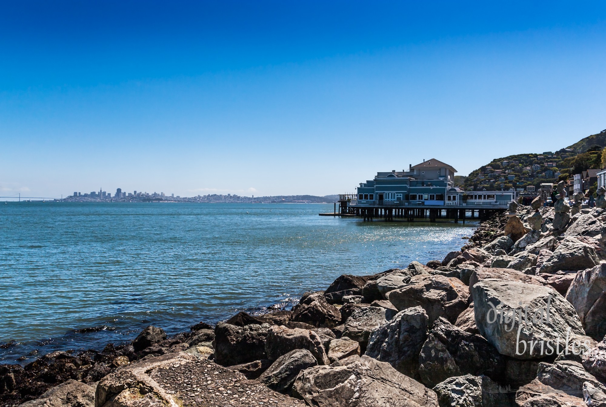 View across San Francisco Bay from the Sausalito waterfront along the Bridgeway Promenade