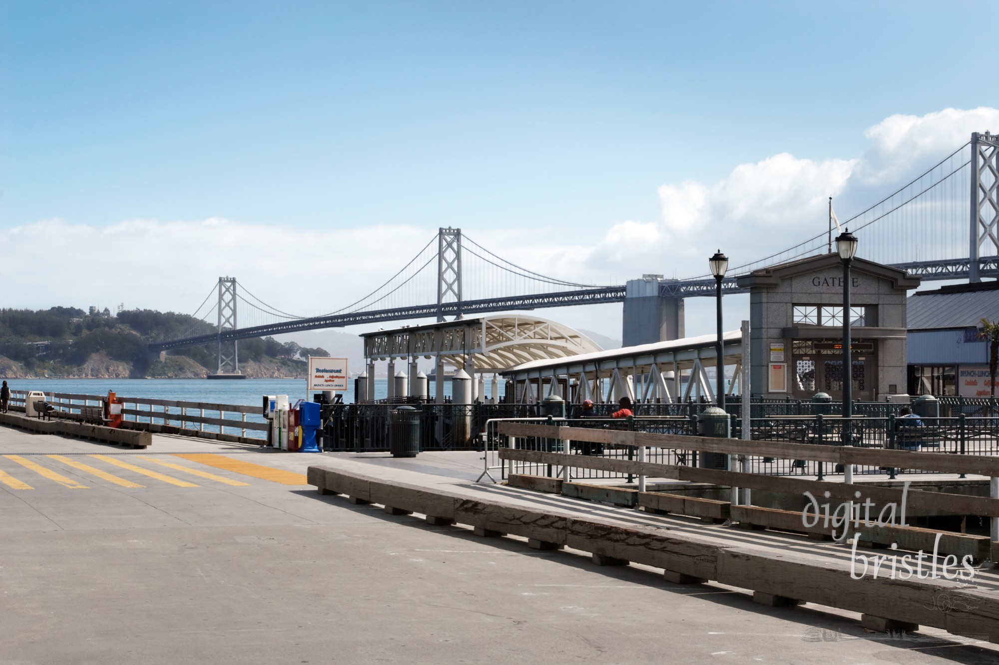 Ferry terminal in San Francisco with Oakland Bay Bridge in the background