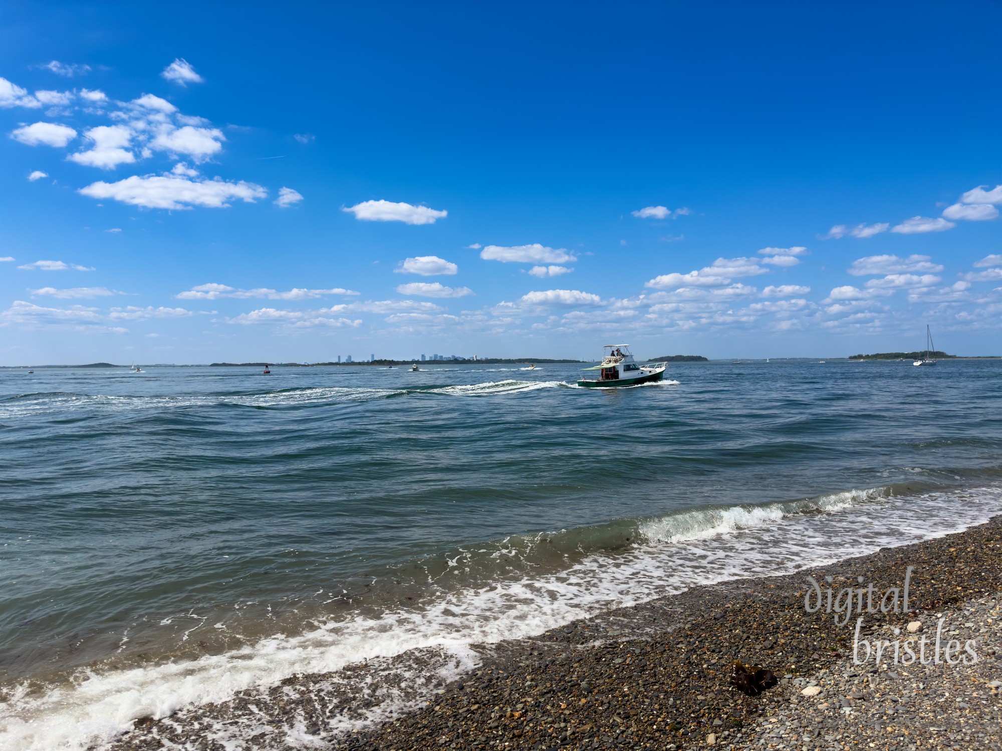 View from Hull across the bay  to the Boston skyline on a sunny Summer afternoon