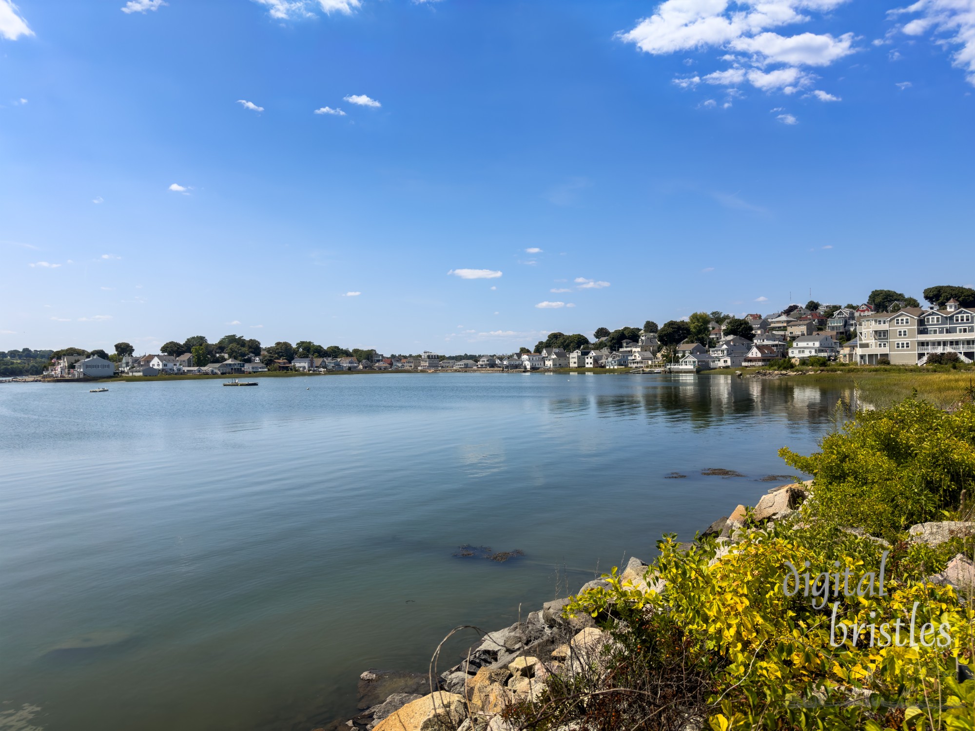 Homes pack the edges of the bay in Hull, Massachusetts, by Nantasket Beach