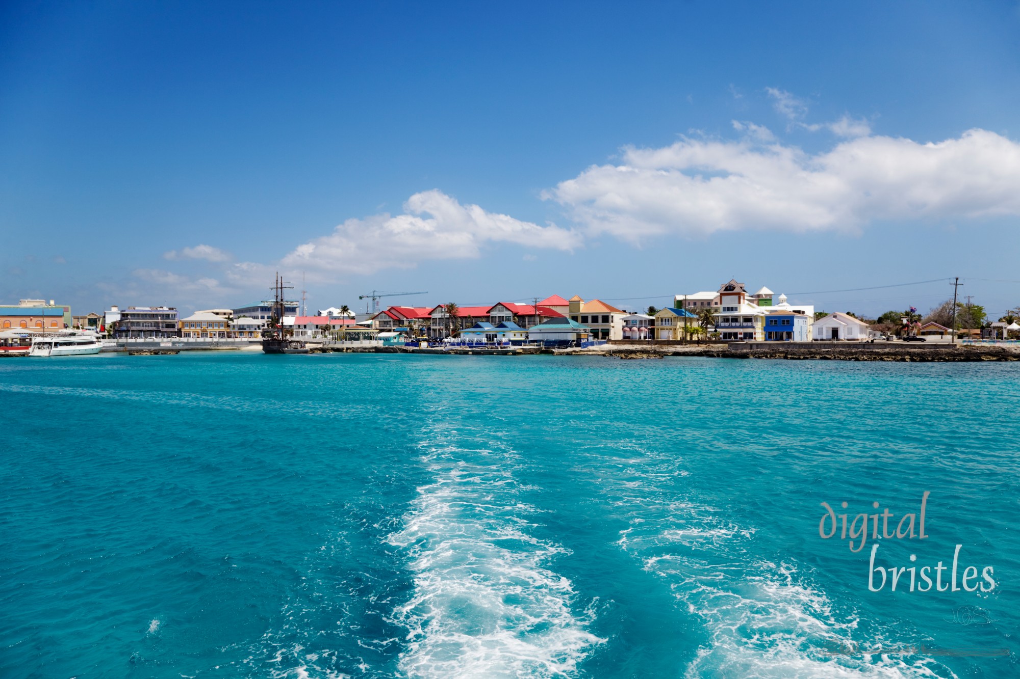 Georgetown waterfront, Cayman Islands, from the water on a sunny afternoon