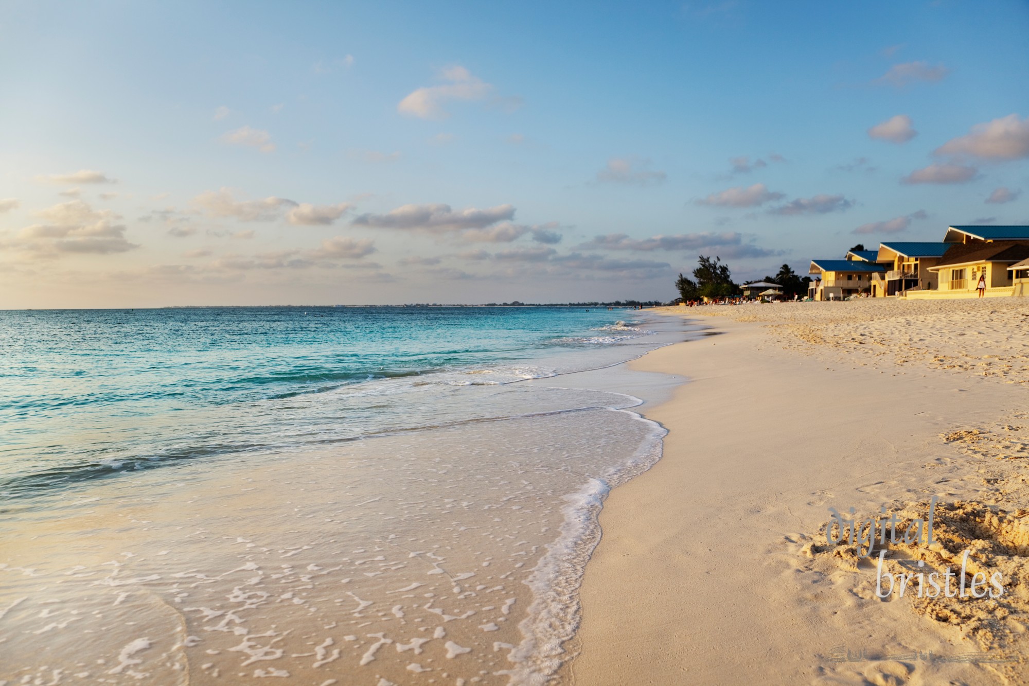 Sunset light warms Seven Mile Beach, Grand Cayman