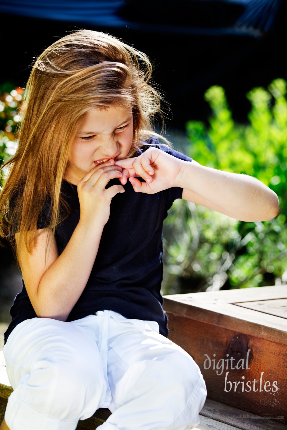 Bad habits - young girl biting her nails