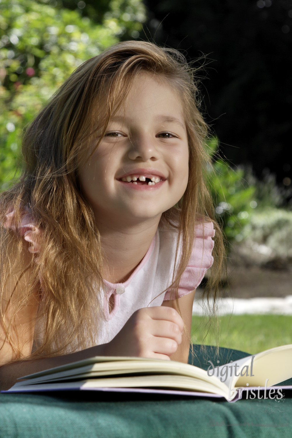 Young girl enjoying a good book