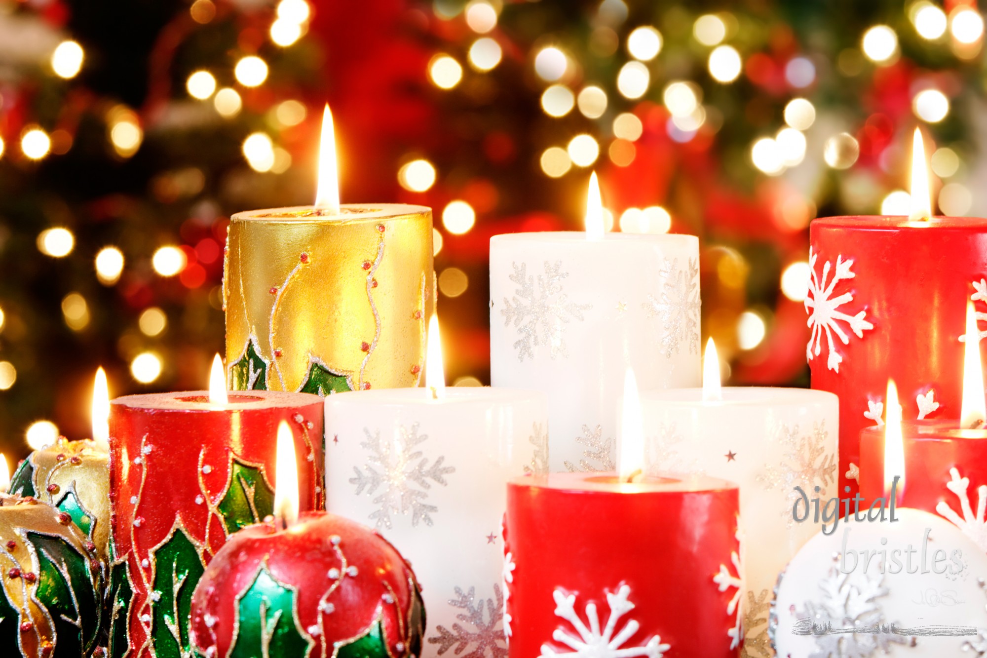 Collection of Christmas candles with blurred light background