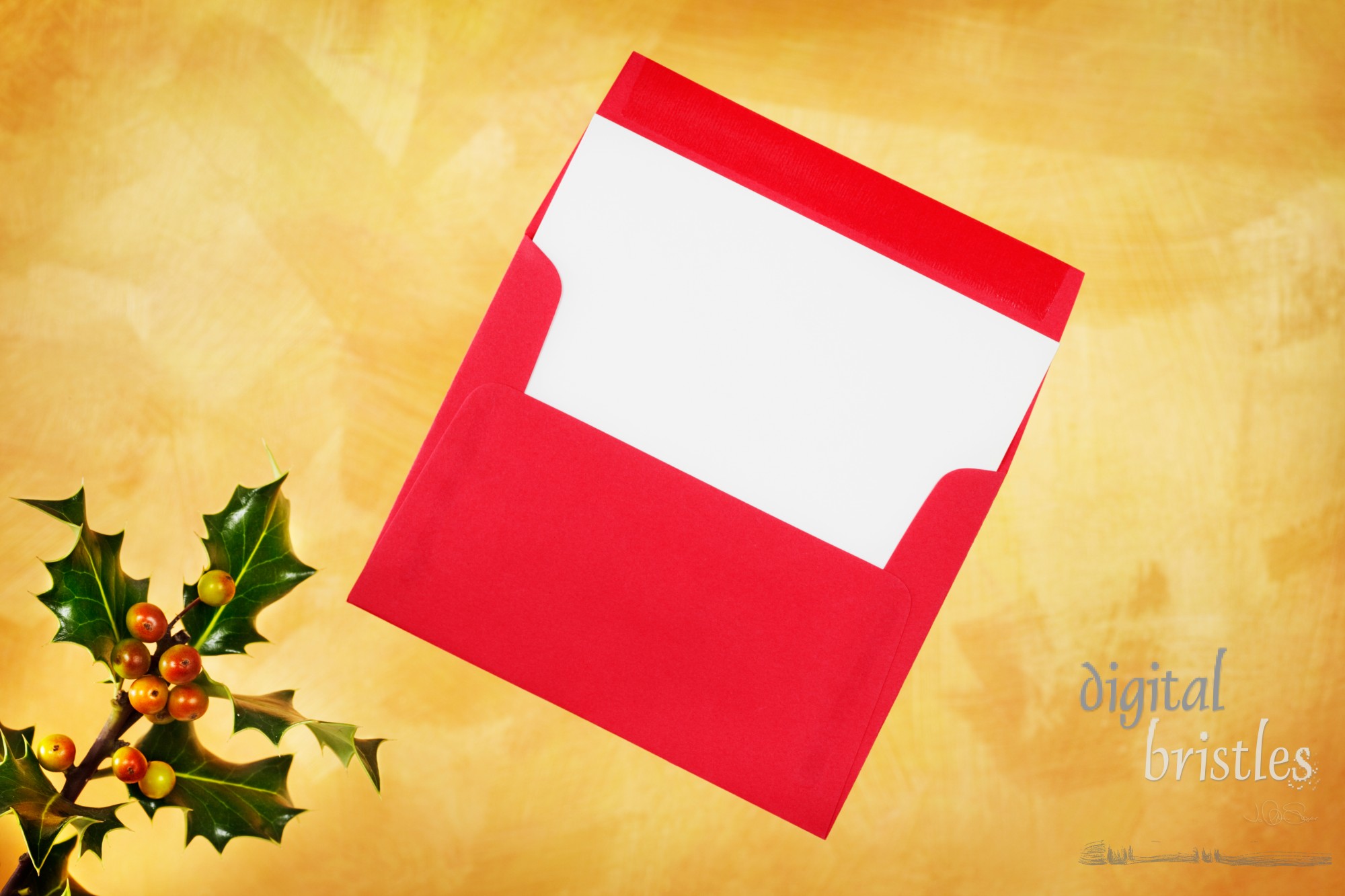 Holiday card and envelope on a hand painted gold background