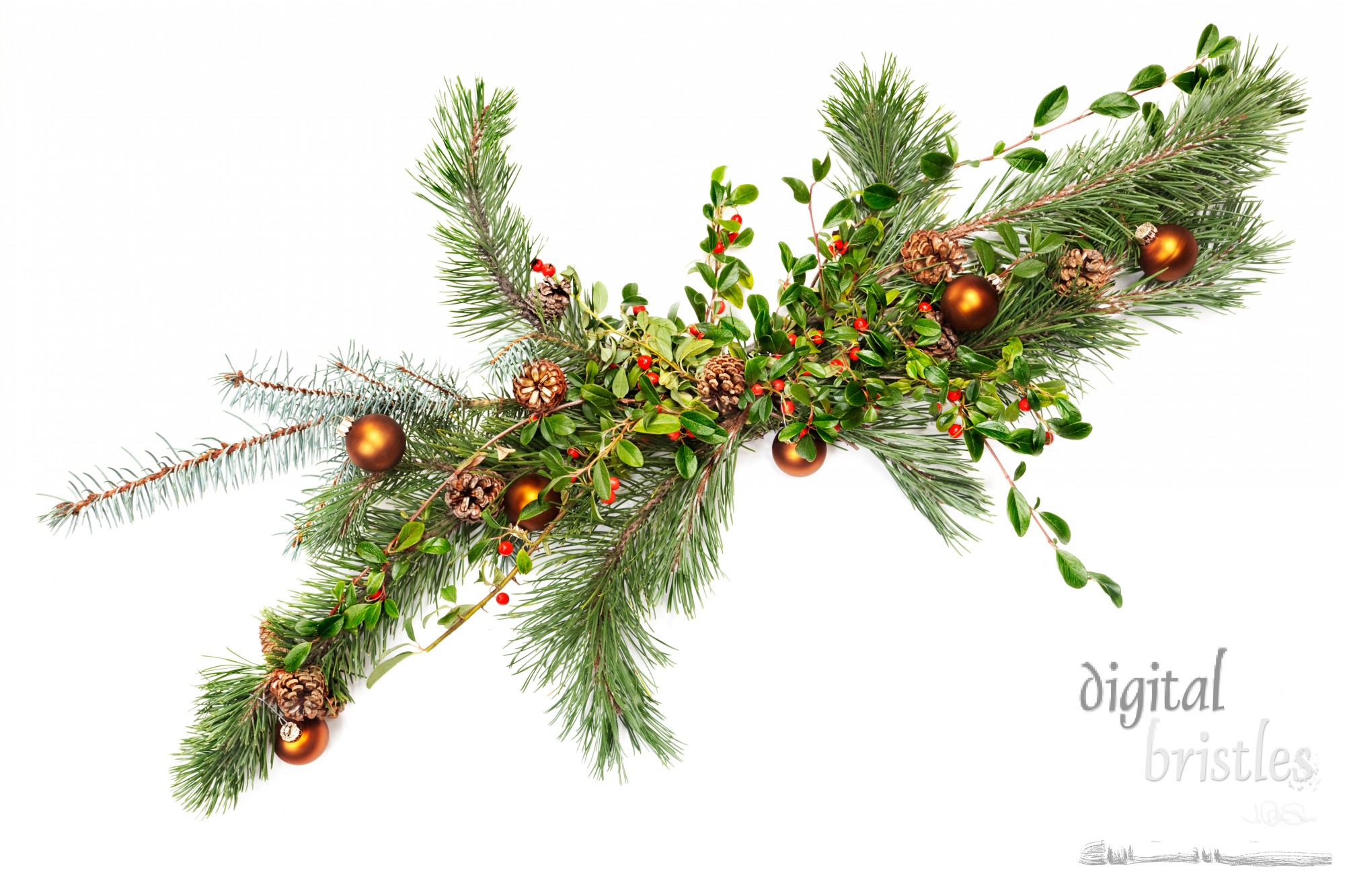 Holiday garland with ornaments, pine & spruce branches, pine cones and evergreen with berries (Common Bearberry/Kinnikinnick).  Shot straight down but at an angle to get maximum length in frame.