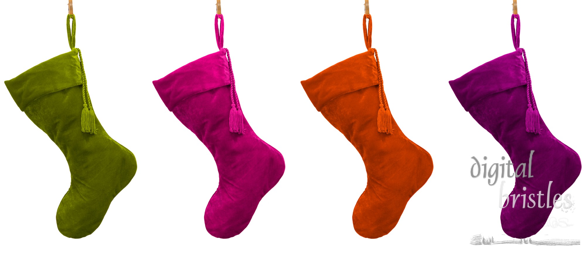 Four isolated velvet Christmas stockings in non-traditional colors