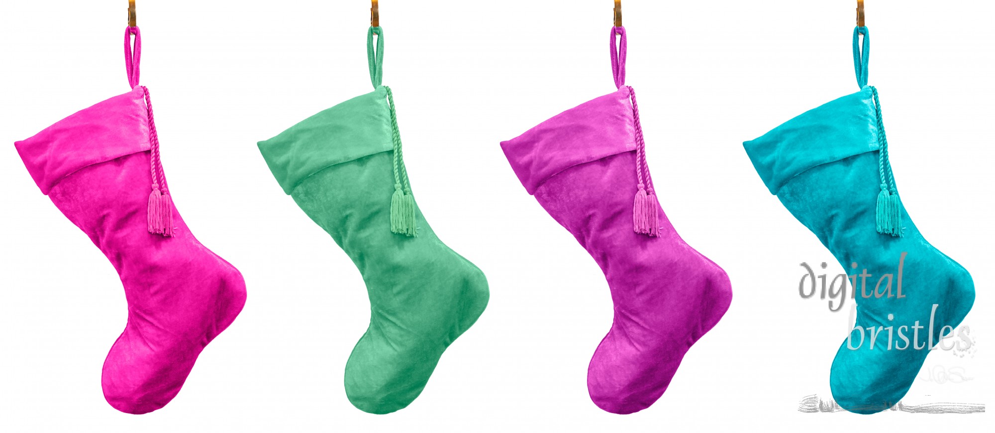 Pastel velvet Christmas stockings hanging from brass hooks