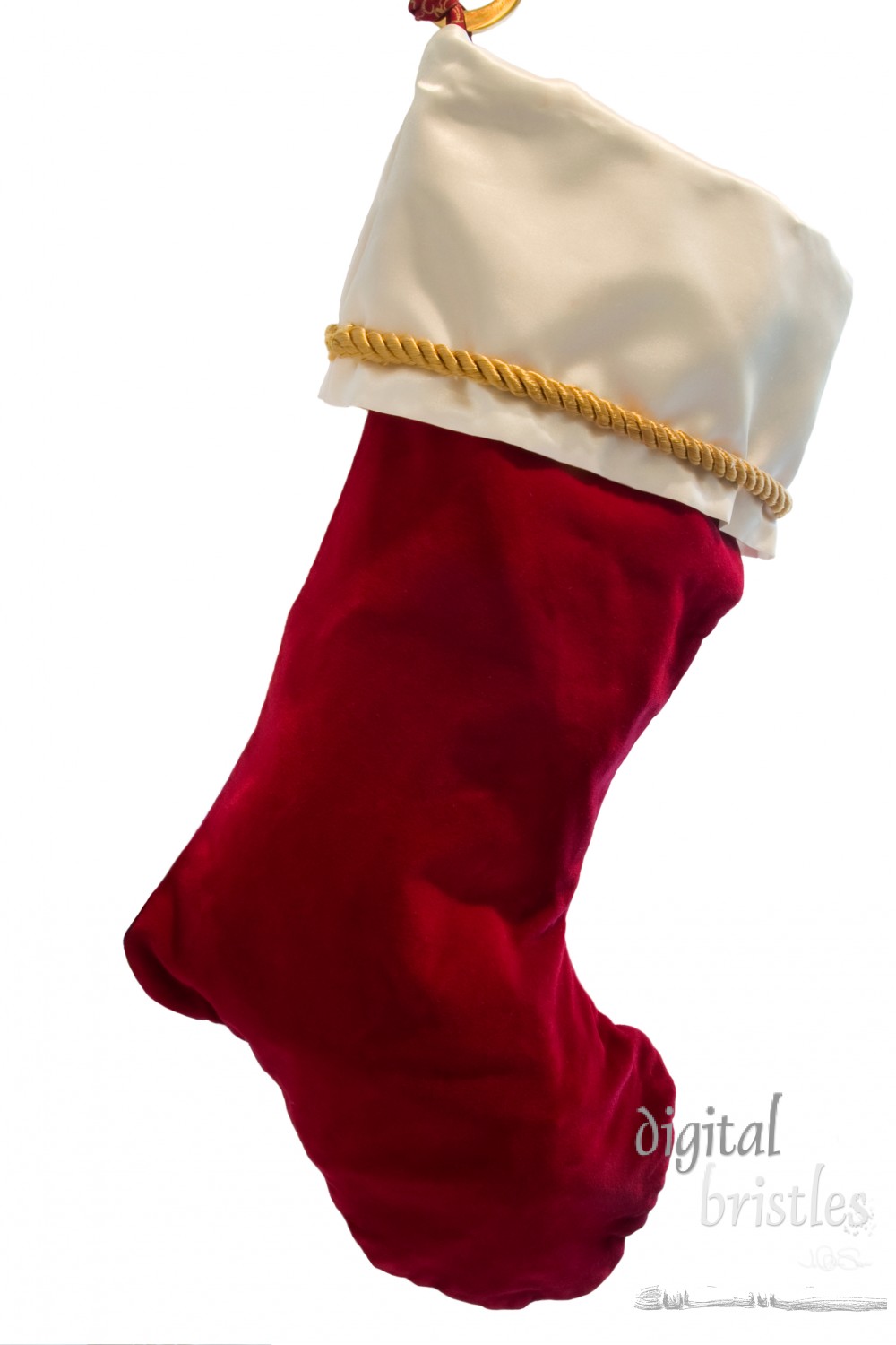 Rich velvet and satin stocking hanging by the mantelpiece