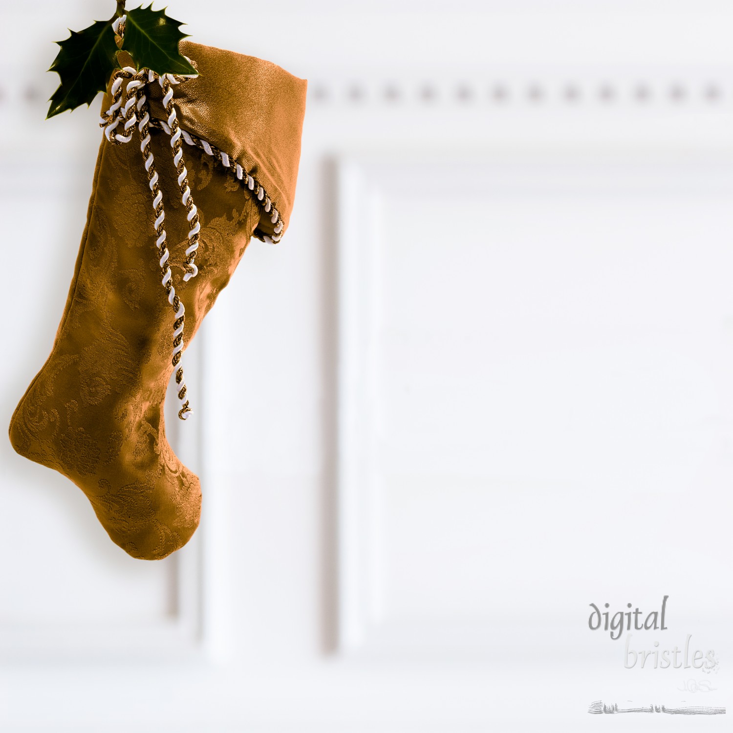 Deep gold Christmas stocking, hanging by the fireplace mantel