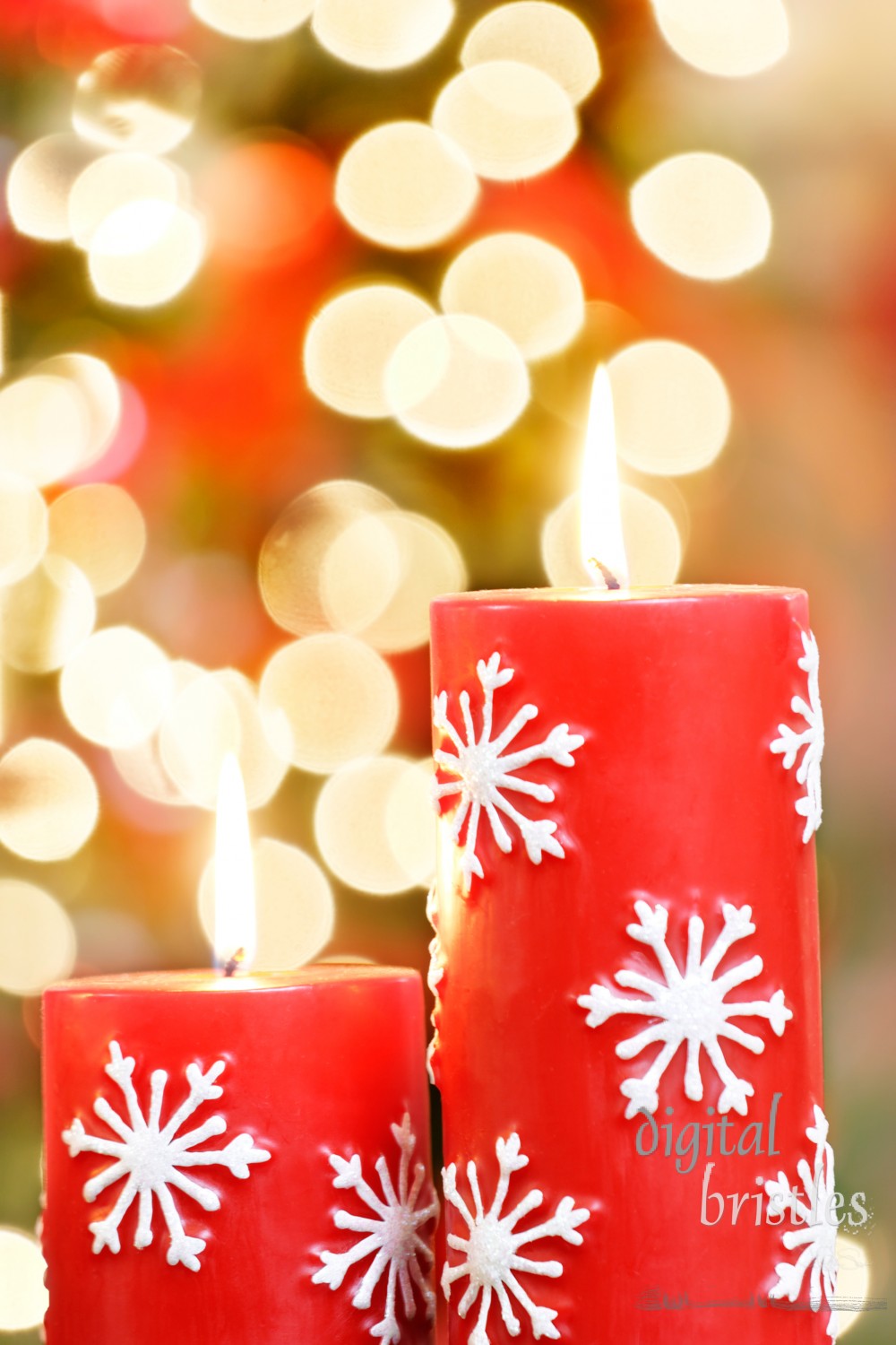 Christmas candles against blurred holiday lights background