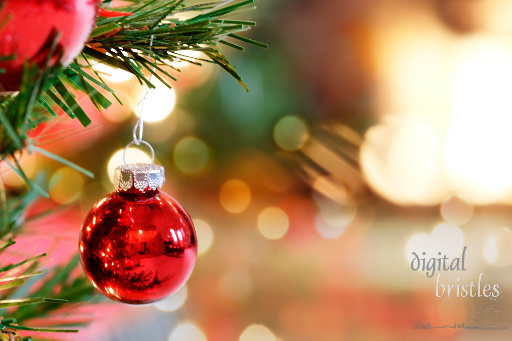 Red Christmas Tree bauble by the fireplace 