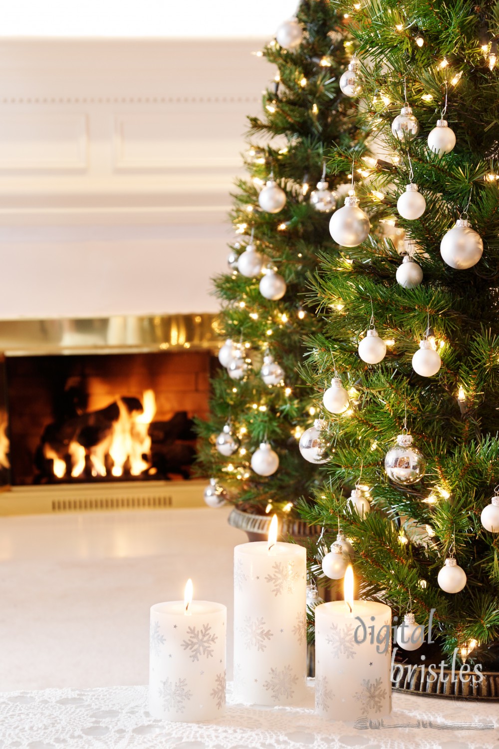 Snowflake candles and glittering decorations by a warm fire