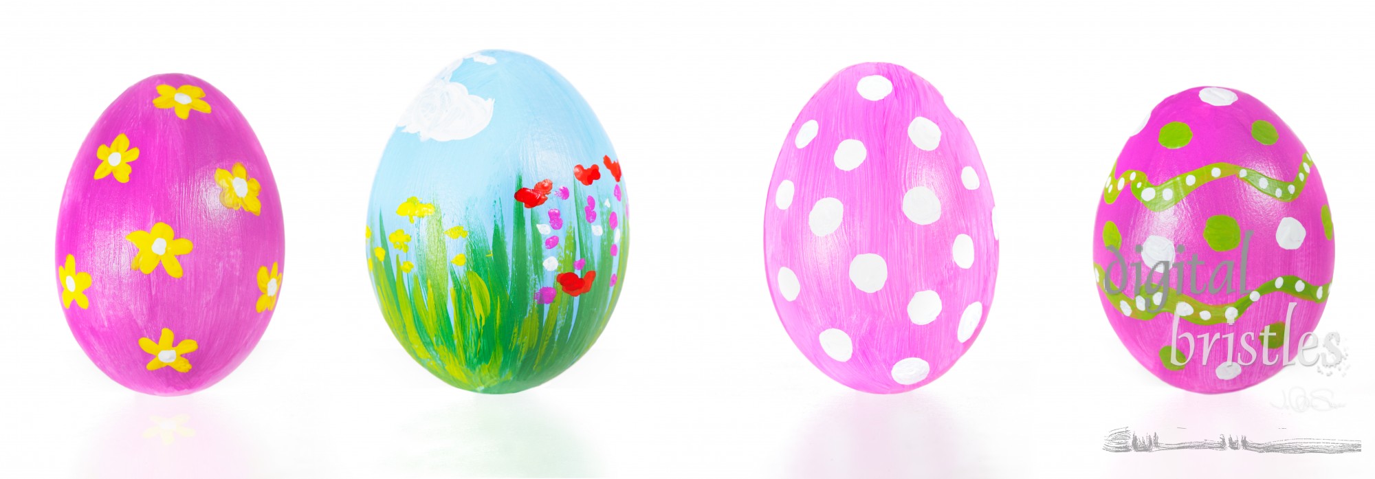 Four colorful painted Easter eggs