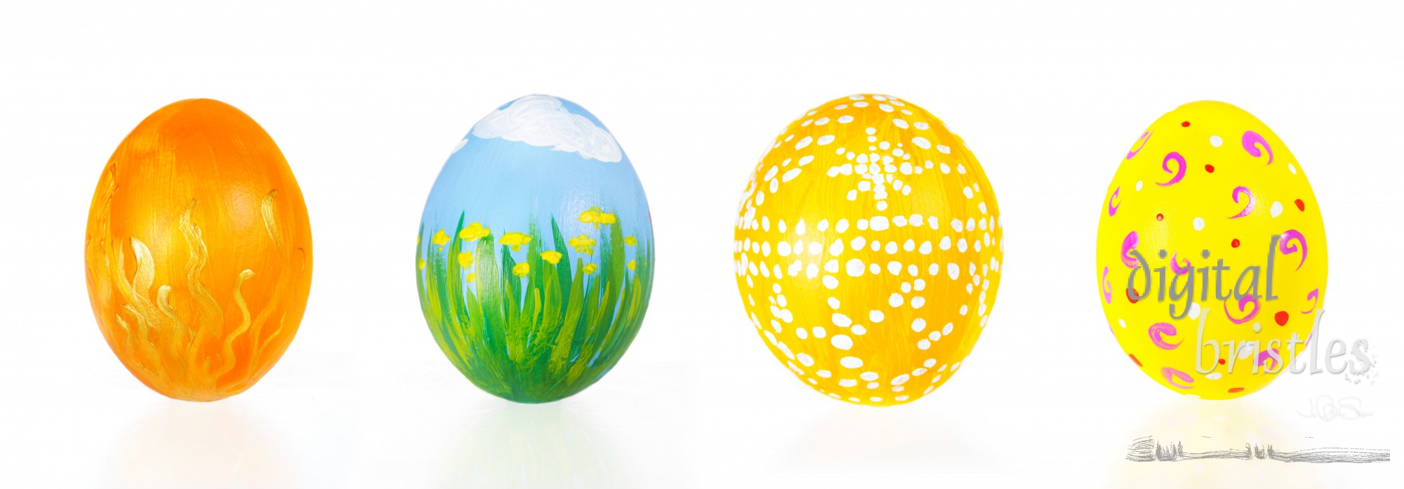 Four colorful painted Easter eggs