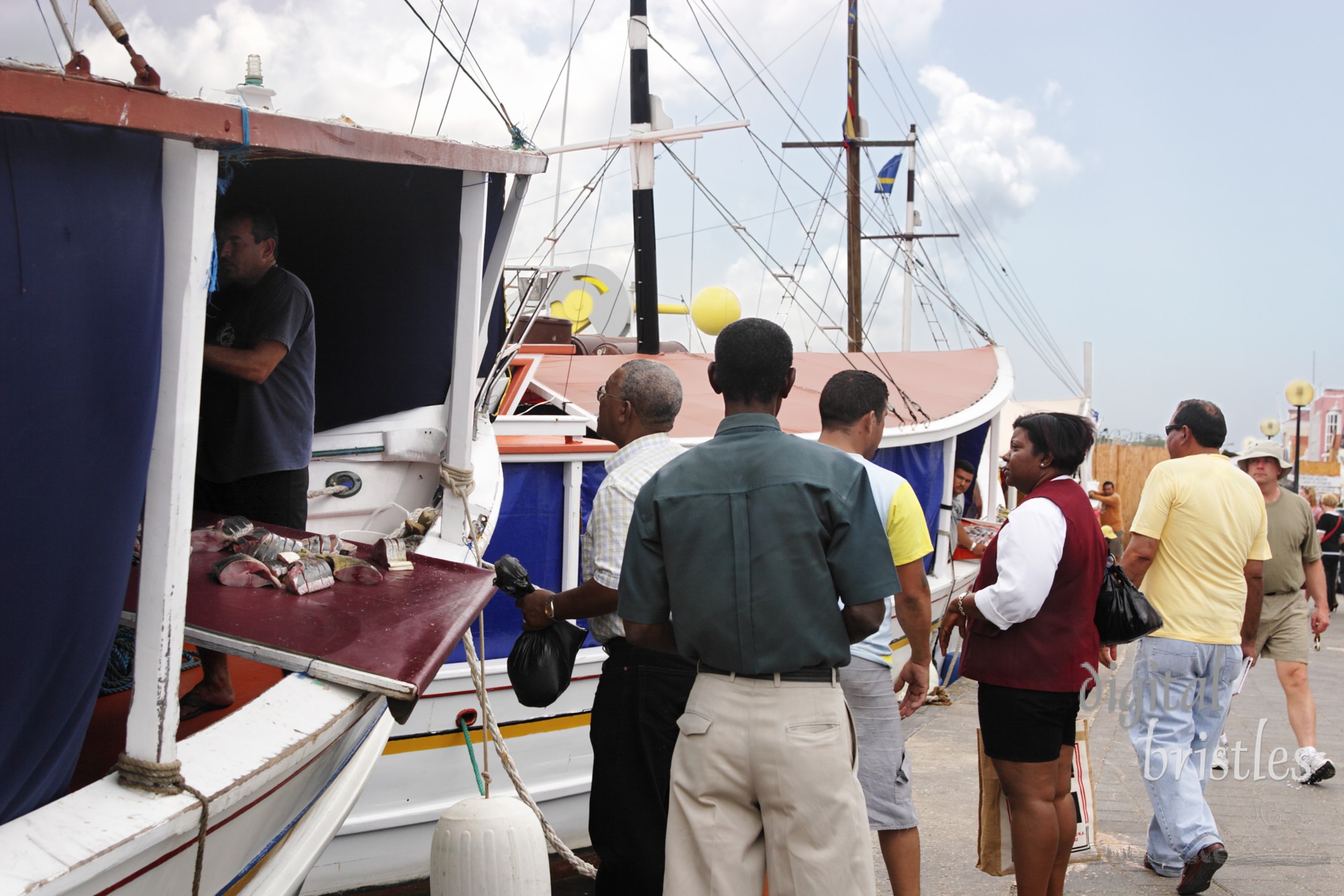 Buyers at the floating fish market, Willemstad, Curacao