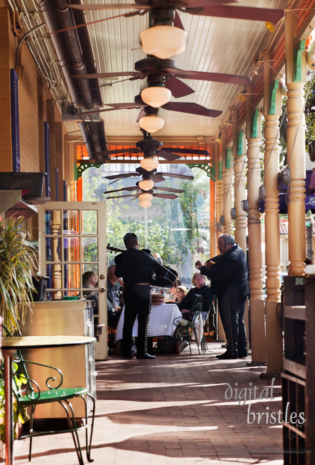 Mariachi singers serenade diners on La Margarita's outside patio. La Margarita is in the center of Market Square, an area of shops and restaurants that has been the public market in San Antonio since 1894. El Mercado closed in 1950 as a working market  but was revitalized in 1976.