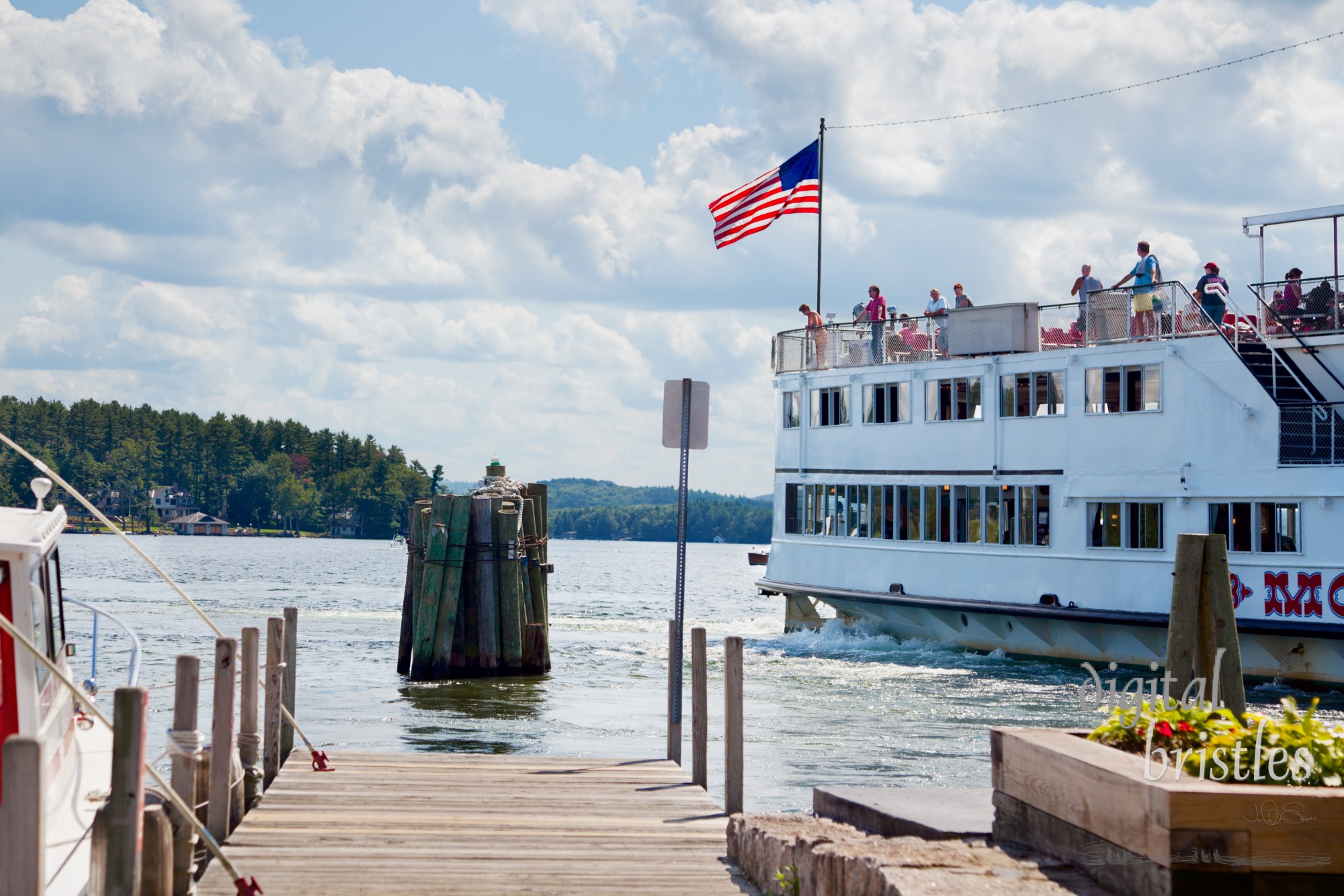 The M/S Mount Washington leaving the dock in Wolfeboro. The Mount cruises Lake Winnipesaukee stopping at five towns: Weirs Beach, Wolfeboro, Alton Bay, Center Harbor and Meredith. Lake Winnipesaukee, about 69 square miles, is New Hampshire's largest lake and a popular tourist destination.