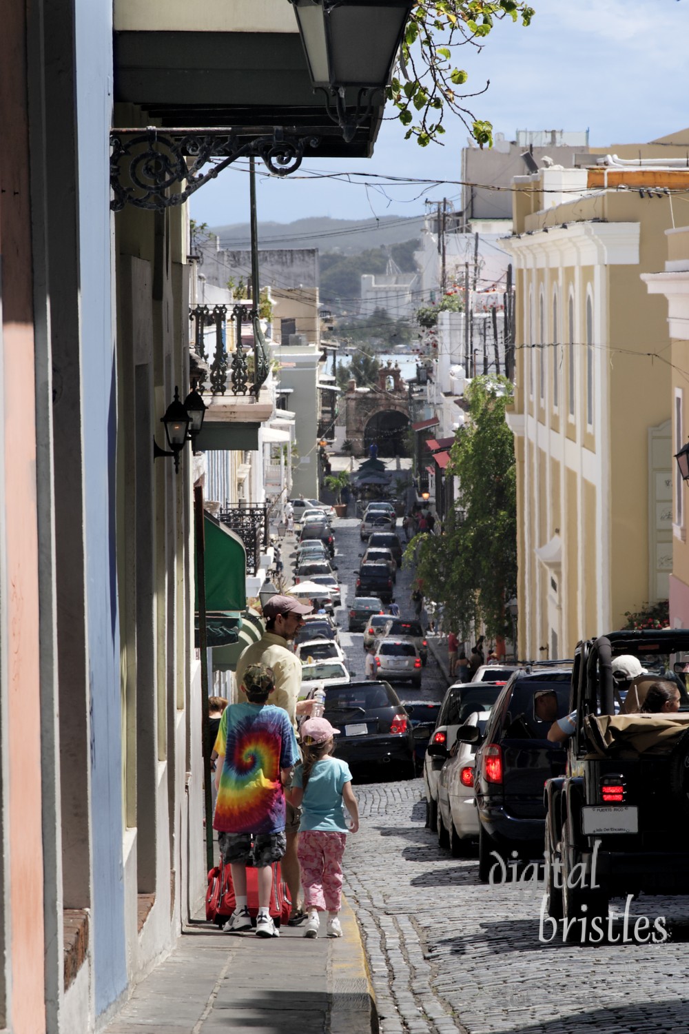 Walking down crowded Calle Cristo in Old San Juan, Puerto Rico