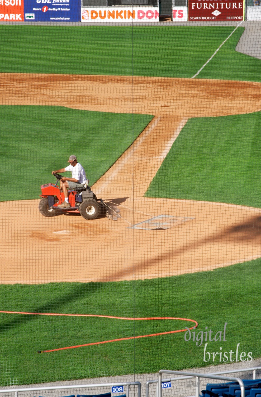 Preparing the bases for the evening game, Portland Sea Dogs, Portland, ME