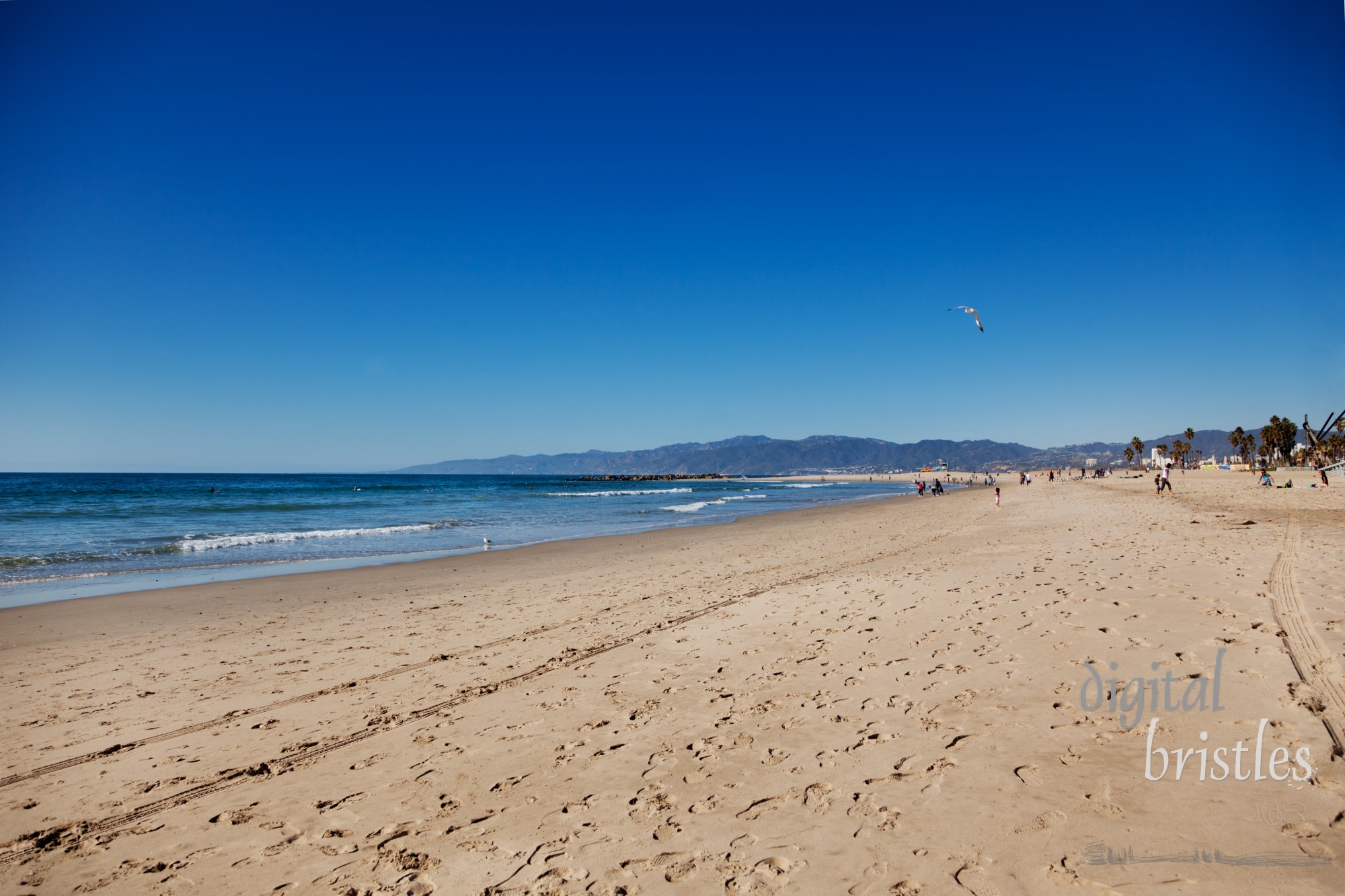 Christmas Day on Venice Beach looking north past the steel sculpture 