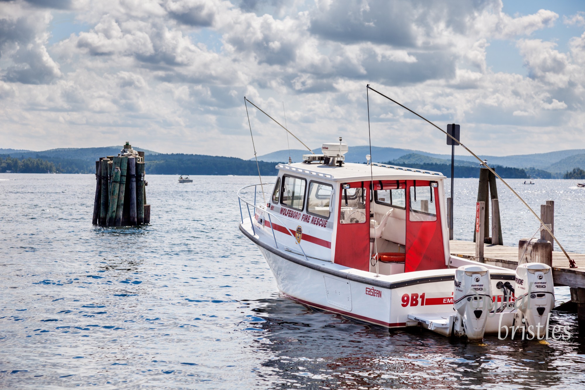 Aug 25, 2009, Wolfeboro, New Hampshire. The Wolfeboro Fire Department rescue boat at the dock on Lake Winnepesaukee. Lake Winnipesaukee, about 69 square miles, is New Hampshire's largest lake and a popular tourist destination. The boat is a 2006 27' Eastern Boat with twin 150hp Evenrude engines, equipped with medical and forestry equipment / tools.