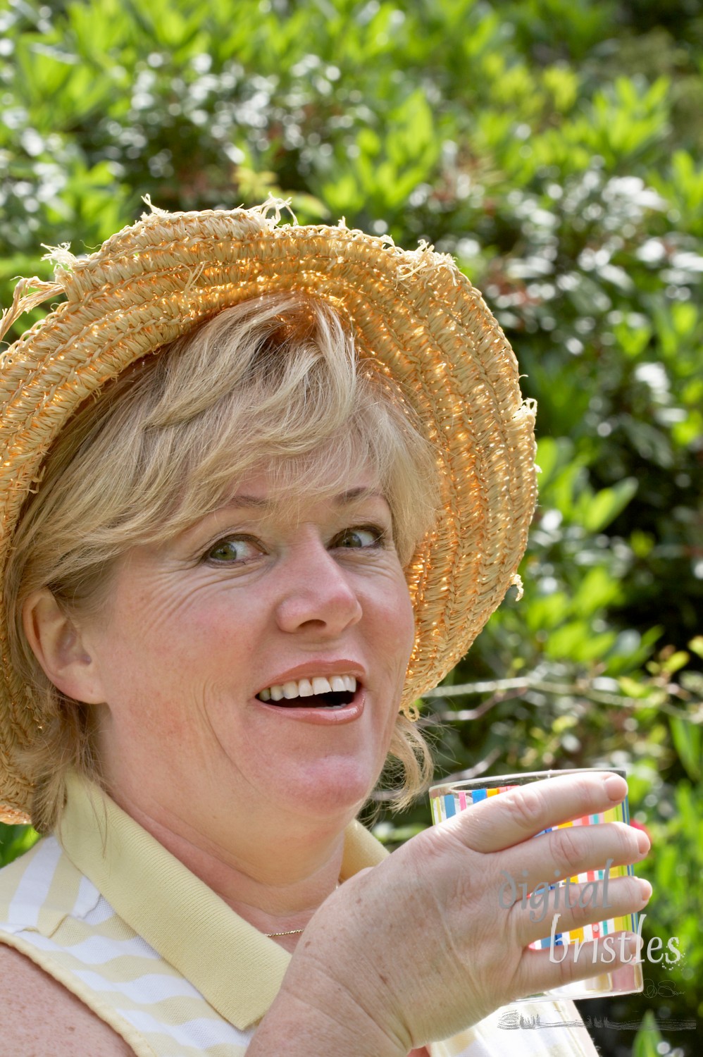 Mature woman with an ice cold drink