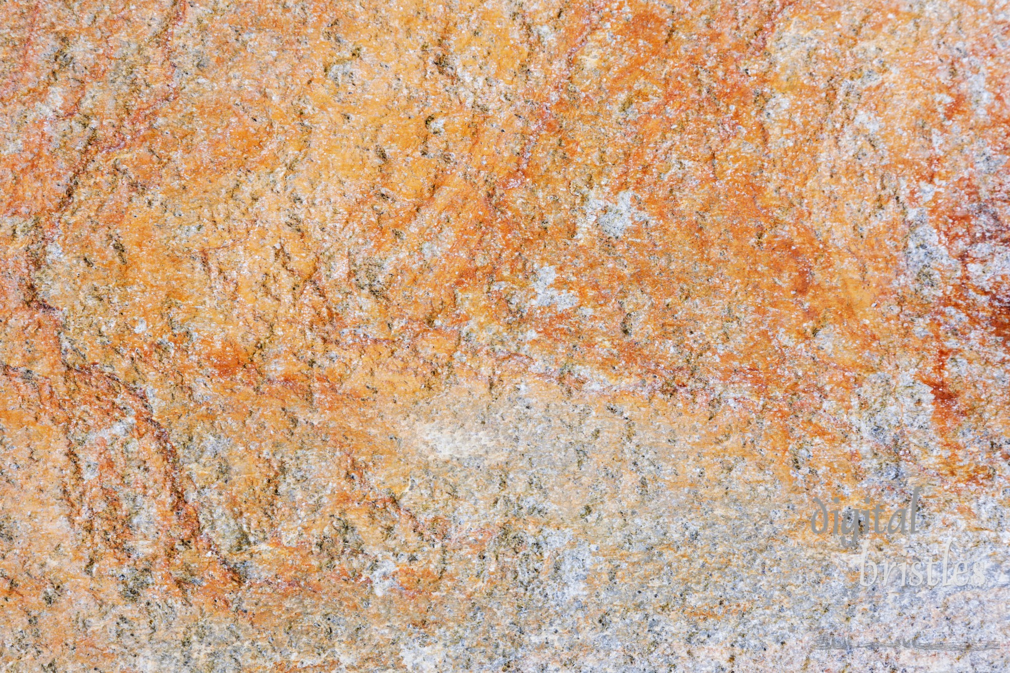 The textured surface of a stone paver