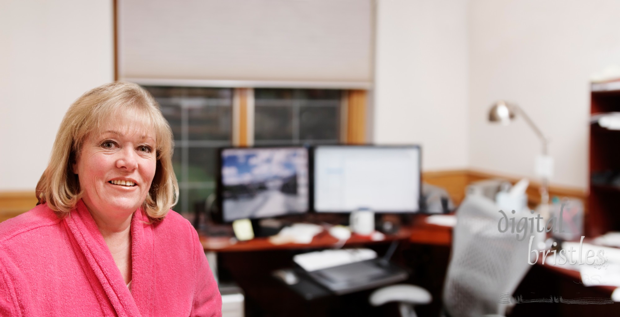 Mature woman in her home office