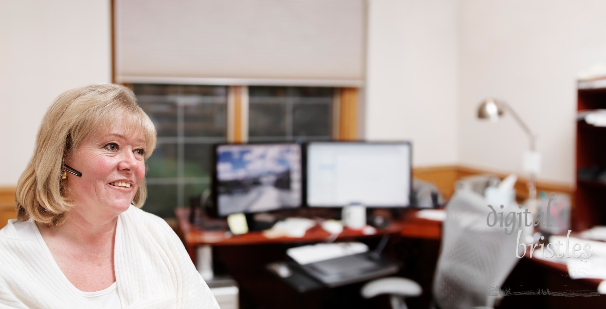 Mature woman in her home office