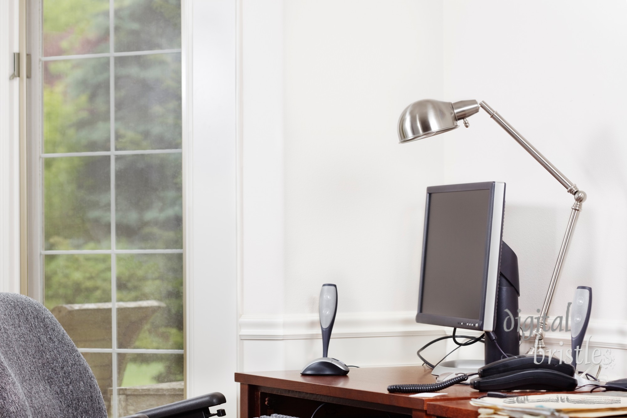 Bright, tidy home office. Clipping path for monitor image.